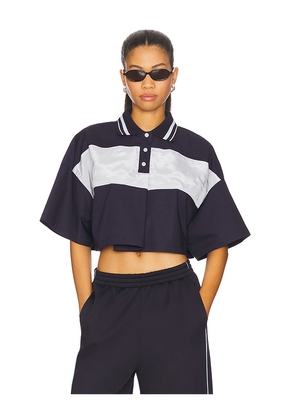 WE11DONE Cropped Polo Top in Navy. Size M. Also in L, S.