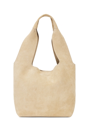 Veronica Beard Suede Sling Bag in Tan.