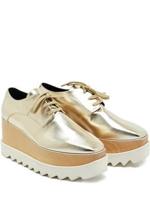 Stella McCartney Pre-Owned Elyse star-cut platform sneakers - Gold