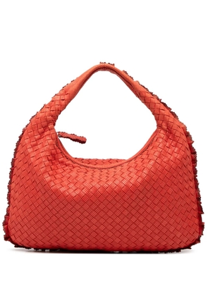 Bottega Veneta Pre-Owned 2012-2026 Small Perforated Nappa Intrecciato Veneta hobo bag - Red