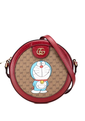 Gucci Pre-Owned 2016-2025 Micro GG Supreme Doraemon Round crossbody bag - Brown