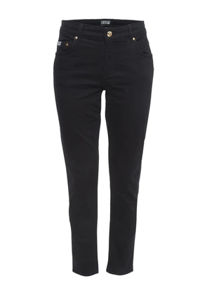 Versace Pre-Owned logo-embroidered jeans - Black