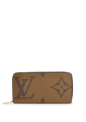Louis Vuitton Pre-Owned 2021-2025 Monogram Giant Reverse Zippy Wallet long wallets - Brown