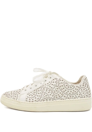 Alaïa Pre-Owned laser-cut low-top sneakers - White