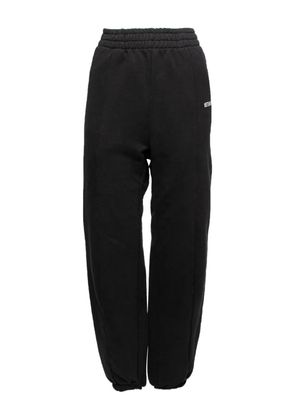 VETEMENTS logo-embroidered track pants - Black