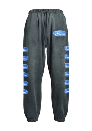 SAINT MXXXXXX logo-print pants - Black