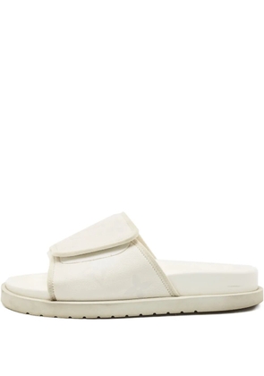 Louis Vuitton Pre-Owned monogram flat slides - Neutrals