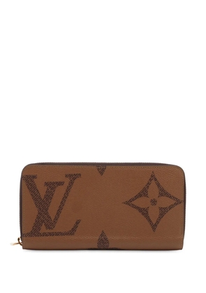 Louis Vuitton Pre-Owned 2021-2025 Monogram Giant Reverse Zippy Wallet long wallets - Brown