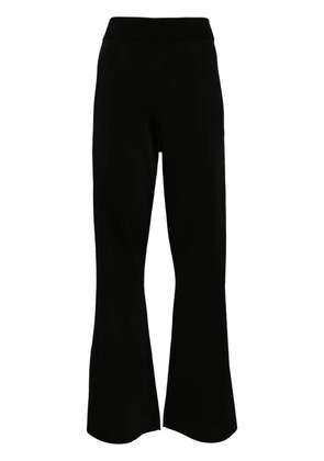 Studio Nicholson high-waist flared trousers - Black