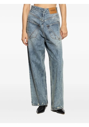 VETEMENTS distressed V-yoke jeans - Blue