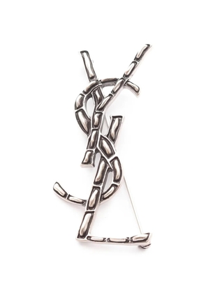 Saint Laurent Pre-Owned 10s embossed brooch - Silver