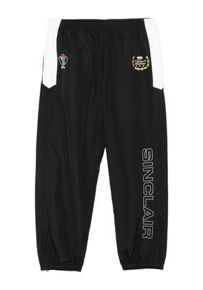 Sinclair logo-embroidered track pants - Black