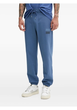 HUGO logo-patch elasticated-cuff track pants - Blue