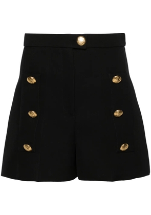 Alexander McQueen logo-engraved buttons shorts - Black