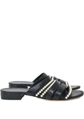 CHANEL Pre-Owned pearl-embellished CC sandals - Black