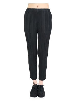 Pleats Please Issey Miyake pleated tapered trousers - Black