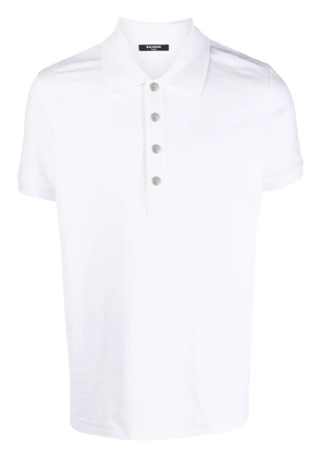 Balmain monogram-pattern piqué polo shirt - White