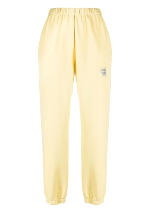 Opening Ceremony warped logo-print track pants - Yellow