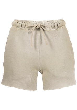 Cotton Citizen faded raw-cut track shorts - Yellow