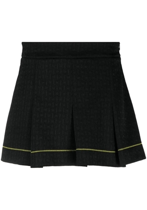 GANNI contrast-trim pleated miniskirt - Black