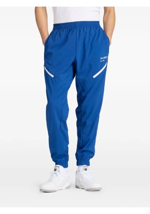 New Balance graphic-detail track pants - Blue