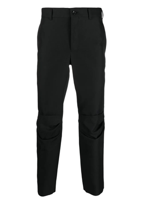 Comme des Garçons Homme Plus mid-rise tapered trousers - Black