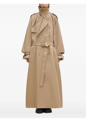 VETEMENTS double-breasted belted trench coat - Neutrals