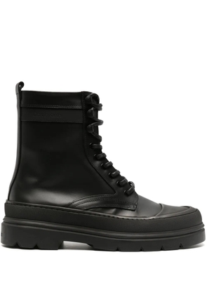 Calvin Klein logo-debossed leather ankle boots - Black