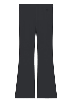 Courrèges embroidered logo flared-leg trousers - Black