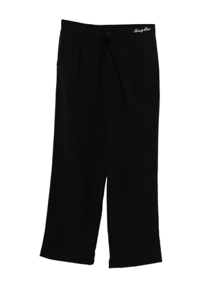 Family First logo-embroidered trousers - Black