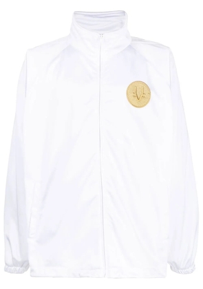 VETEMENTS logo-patch sport jacket - White