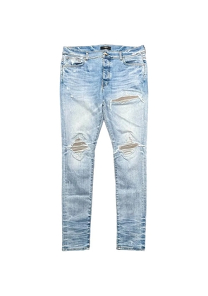 AMIRI distressed straight-leg jeans - Blue