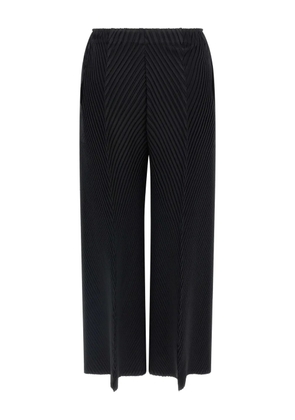 Issey Miyake chevron-pleating trousers - Black