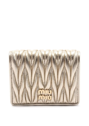 Miu Miu Pre-Owned 2010-2025 Metallic Matelasse Wallet small wallets - Gold