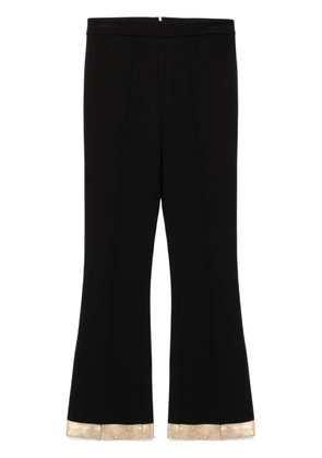 Cynthia Rowley gold-hem flared trousers - Black