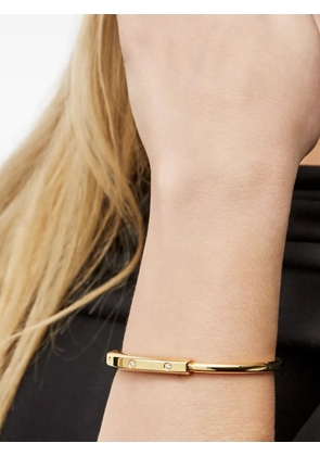 Tiffany & Co. 18K yellow gold medium Lock diamond bangle bracelet