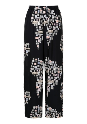 Amir Slama text-print straight-leg trousers - Black