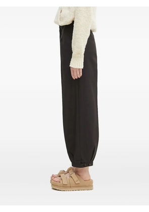 visvim pressed-crease trousers - Black