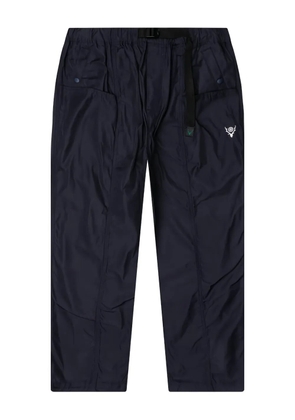 SOUTH2 WEST8 logo-print trousers - Blue