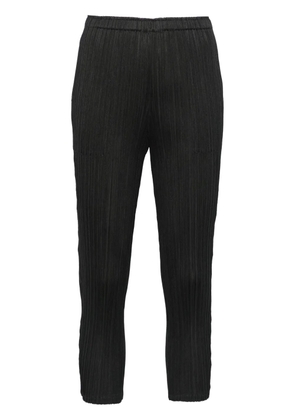 Pleats Please Issey Miyake Wormhole trousers - Black