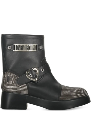 Moschino buckle-detailed studded ankle boots - Black