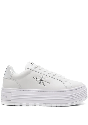 Calvin Klein Jeans logo-debossed leather flatform sneakers - White