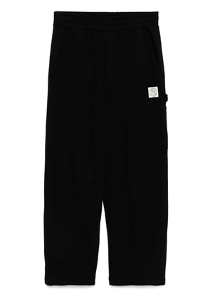 izzue logo patch sweatpants - Black