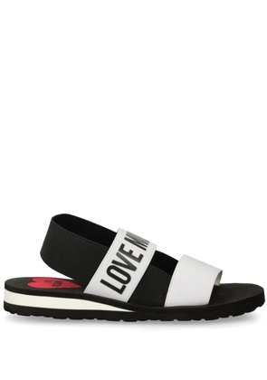 Love Moschino logo-print sandals - White