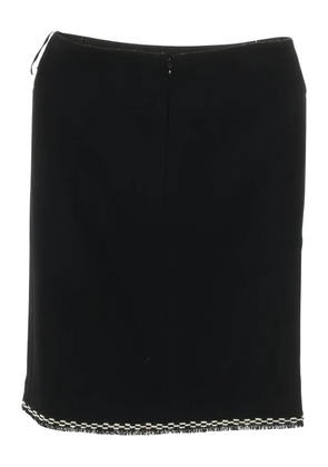 CHANEL Pre-Owned 1986-1988 tweed fringed midi skirt - Black