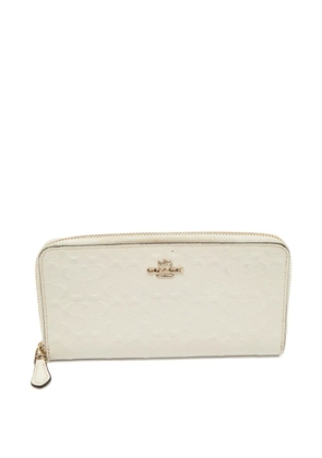 Coach Vintage embossed patent-leather zip wallet - White