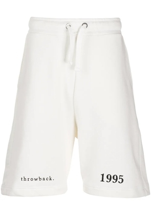 Throwback. logo embroidered track shorts - White