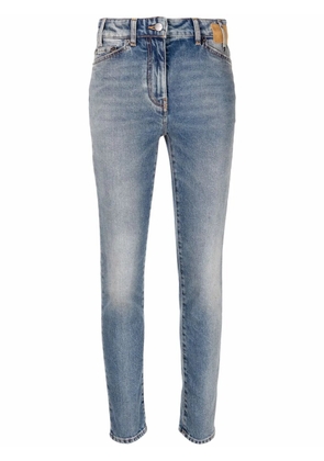 Palm Angels logo-patch denim jeans - Blue