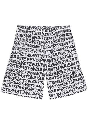 VETEMENTS logo-print cotton shorts - White