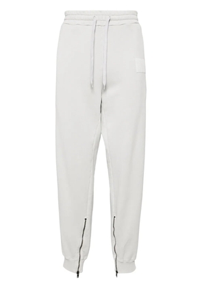 Moschino logo-patched track pants - Grey